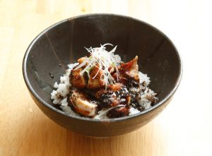 Black rice bowl with black garlic oil sauce